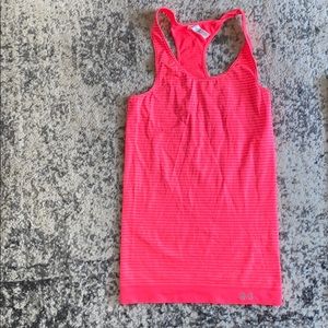 Under Armour right pink workout top